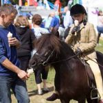 Perth Show…05.08.16
Good weather for once at the Perth Show, Mya Duncan-Walker (9) her dad Bruce and pony Harviestoun-Romanov enjoying ice creams.
Picture by Graeme Hart.
Copyright Perthshire Picture Agency
Tel: 01738 623350  Mobile: 07990 594431