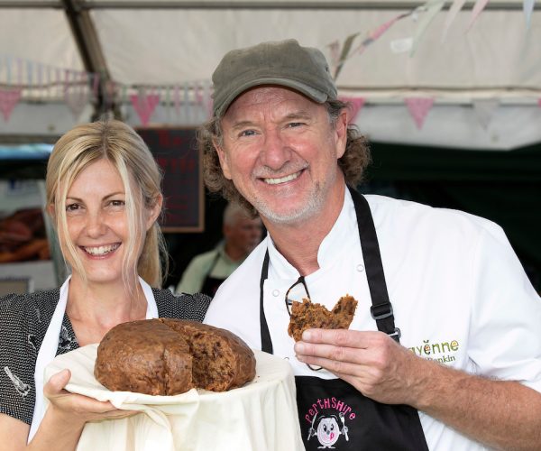 FREE TO USE PHOTOGRAPH.  Perthshire on a Plate..03.08.18
Chef Paul Rankin who officially opened the 2018 Perthshire on a Plate Festival pictured with Michelle Maddox of Clootie McToot Traditonal Dumplings with a giant clootie dumpling. On his first ever visit to Perth Chef Paul Rankin spent the day doing cooking demonstrations, meeting local food and drink producers and chatting with the many visitors to Perth Show.
for further info please contact Maureen Young on 07778 779888
Picture by Graeme Hart. 
Copyright Perthshire Picture Agency
Tel: 01738 623350  Mobile: 07990 594431
