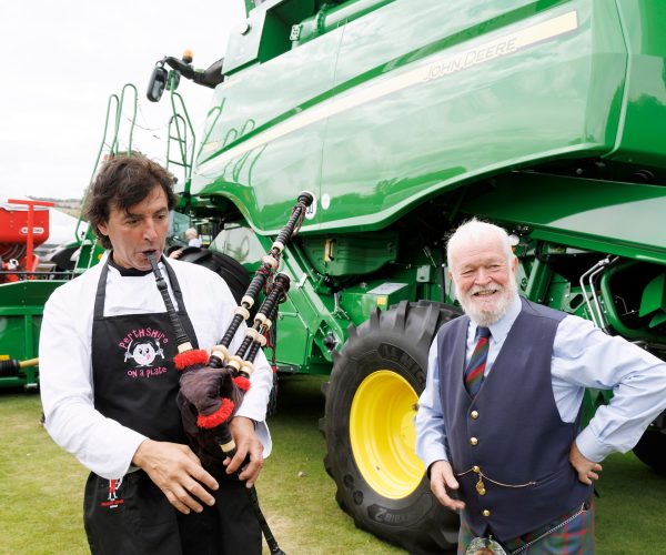 Perthshire on a Plate at Perth Show 2022
Guest chef Jean Christophe Novelli learning to play the bagpipes with Perth & District Pipe Major Ian Stevenson.
Picture by Graeme Hart.
Copyright Perthshire Picture Agency
Tel: 01738 623350  Mobile: 07990 594431